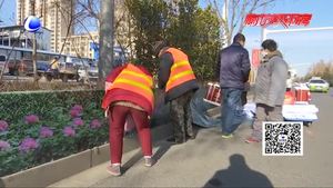 擋雪板上貼“壁紙”風景更亮麗 提醒市民：公共設施還需人人愛護