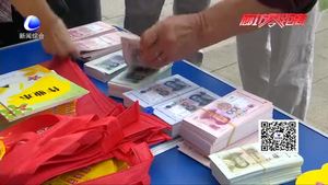 我市各銀行在市區(qū)集中開展反假幣宣傳活動(dòng)