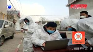 一襲藍衣似火焰 “疫”線勇當“志愿紅”